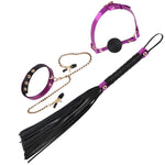 The set includes a stunning purple and gold collar with adjustable buckle closure and attached nipple clamps with soft rubber tips for added comfort. It also features a matching gag ball with a breathable air hole for safe and comfortable use. The gold metal chain connects the collar to the nipple clamps and gag ball, creating a visually striking bondage accessory. Additionally, the set includes a black and purple faux leather whip with soft tassels