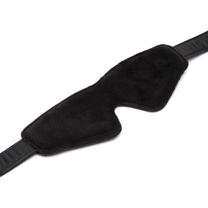 Fifty Shades of Grey Blindfold - Bound to You Black. Perfect for couples who want to introduce light bondage play and excitement to the bedroom. Heighten your senses and enhance sensory anticipation with these sensual and effective bedroom bondage accessories. With soft padding by the eyes.