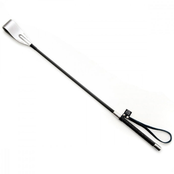 Enliven bedroom bondage play with sensual strokes and punishing spanks from this slender riding crop whip. Sweet Sting boasts leather detail to the wrist strap and tip, a braided stem and a soft rubber handle. Part of the Fifty Shades of Grey The Official Pleasure Collection approved by author E L James.