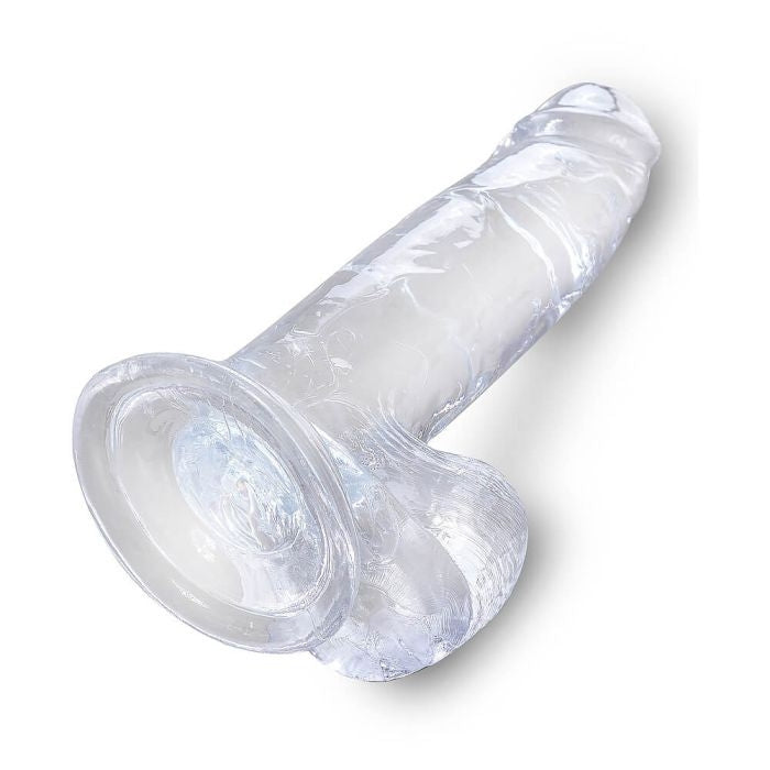 King Cock combines a translucent dildo with a realistic cock design. Its flexible shaft, detailed veins, and defined head, King Cock Clear will engage your senses visually and physically. The powerful suction cup base sticks to nearly any flat surface and makes every dildo harness compatible. 7inches / 18cm.