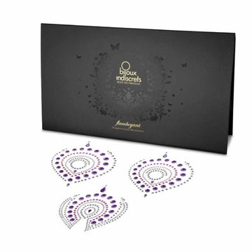 Flamboyant from Bijoux Indiscrets is the perfect accessory when in search of a little bling below the belt! Each set comes with a 2 crystal nipple tattoos and a matching crystal pubic tattoo! Each tattoo has over 150 self-adhering stones and is super easy to apply. Presented in gorgeous packaging, the see through window allows customers to see how beautiful each piece is. Designed for single use, but can be used again with pasty glue.