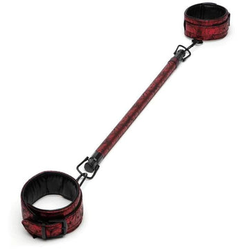 Sweet Anticipation Spreader Bar. With adjustable, padded cuffs for supreme comfort, this 17.5-inch bar spreads lovers' legs for a view you won't forget, and an experience they'll love to remember. A pair of faux leather, padded cuffs embrace your partner's ankles with a firm but comfortable grip thanks to the six-hole buckle fastening, while the solid metal bar helps spread their legs.