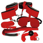 This red bondage set is the ultimate kick for your love games, adjustable and easy to use, let your fantasies take control. Eight binding and tear-proof accessories in red/black. Set consists of 1 padded eye mask, 1 mouth gag, 4 padded cuffs with Velcro fasteners, 1 mini whip, 1 strip with snap lock or cuffs.