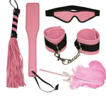 A stunning beginners 5 piece set in pink & Black. This stylish set includes an eye mask, velour leather whip (total length 3cm) for pleasure or pain, ostrich feather tickler for sensual play (total length 45cm), paddle for erotic spanking (331 cm long, 5,5cm wide) and handcuffs (5cm wide handcuffs with Velcro on a short chain with carabiners). This bondage set is perfect for beginners to experience sense play.