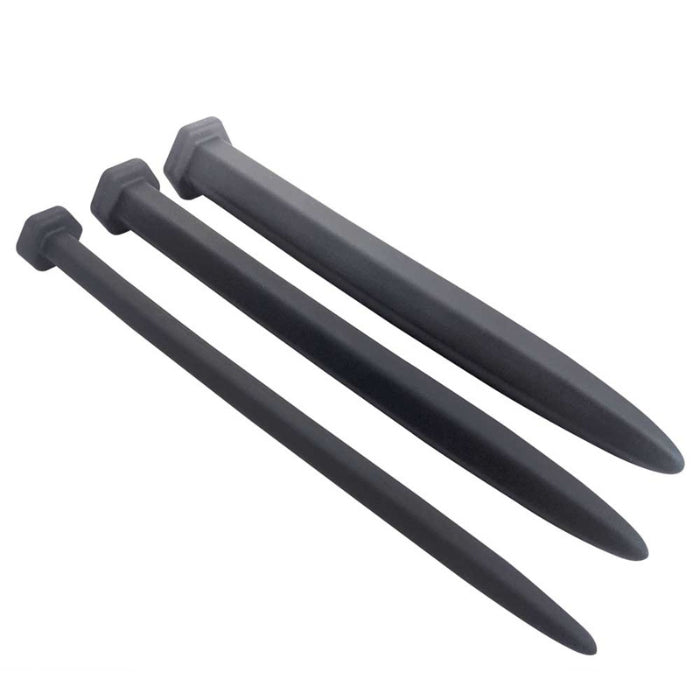 Three different pieces of silicone urethral plugs with a smooth texture, all the same length, but different diameters from 5 mm, 9 mm and 11 mm. These are the new Nailed It! smooth silicone sound set by Brutus.