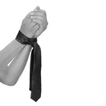 Ensure that your loved one stays in the position you want him/her to be with this Tie Me Up bondage tie. Discover your dominant or submissive side or use it for role playing.  Use the Tie Me Up bondage tie as hand or leg cuffs or even as a blindfold Product dimensions 56.69 inches by 1.85 inches by 0.08 inch.