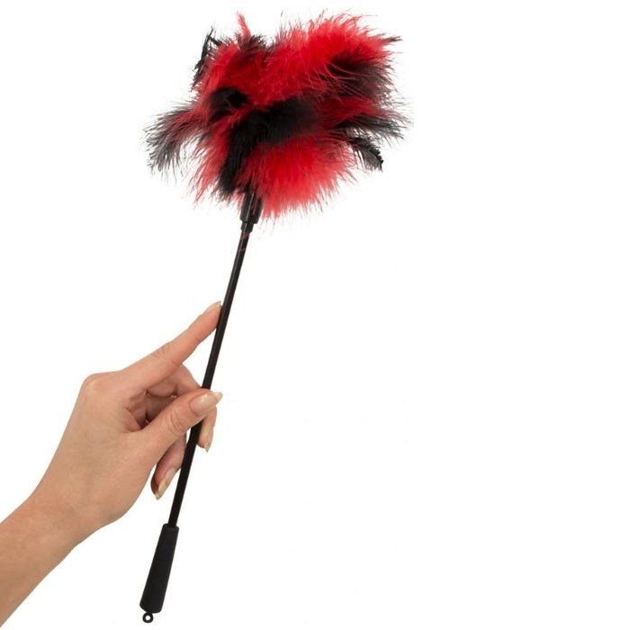 Feather Tickler in red and black is a delicate petting feather that is irresistible. It perfectly ignites the senses during foreplay. This is a gadget that cannot be missing in the bedroom! This is a unique erotic gadget that will give you a lot of pleasure. Its advantages are: a comfortable handle, soft, pleasant to the touch feathers and delicate but durable materials.