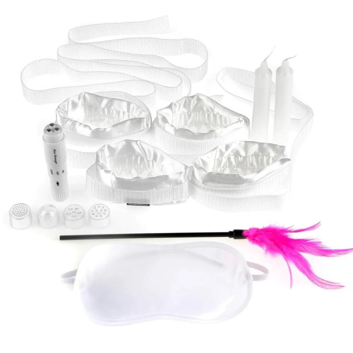 This beginner-friendly BDSM kit is perfect for first-timers and comes with everything you need to explore the raunchier side of your romance. It includes 4 nylon tethers with adjustable satin wrist and ankle cuffs, a discreet mini vibrator for pleasurable stimulation, 2 candles to set the mood, a feather tickler for extra sensation, and a silky satin blindfold for sensory deprivation.
