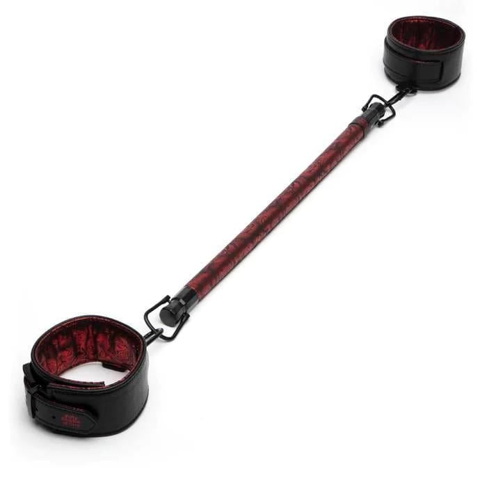 Sweet Anticipation Spreader Bar. With adjustable, padded cuffs for supreme comfort, this 17.5-inch bar spreads lovers' legs for a view you won't forget, and an experience they'll love to remember. A pair of faux leather, padded cuffs embrace your partner's ankles with a firm but comfortable grip thanks to the six-hole buckle fastening, while the solid metal bar helps spread their legs.