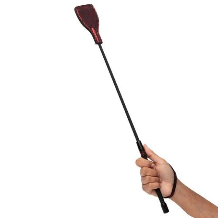 The Fifty Shades of Grey Sweet Anticipation Riding Crop is handcrafted for precision and quality, this beautifully crafted crop boasts a dual-sided tip and flexible spine for ear-bending spanks and delightful stings. With this crop, you'll be able to give your partner exactly what they crave while enjoying the pleasure yourself.