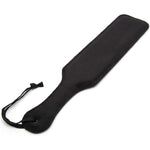 Fifty Shades of Grey Paddle - Bound to You Black, is of the highest quality. Hand stitched on both sides and crafted with faux leather with a twin texture finish. This larger easy to grip handle has a wrist strap for effortless handling. 
