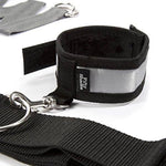 Explore new styles of bondage play with this over the bed cross restraint, which allows ankle and wrist cuffs to be positioned both vertically and horizontally. The quality wrist and ankle cuffs feature a soft satin exterior, with the inside lined with faux fur for a truly comfortable experience. Fastened by secure, adjustable Velcro, the cuffs are simple for a partner to secure and remove, yet provide a highly effective restraint tool for the wearer.
