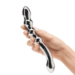 A luxurious and versatile pleasure toy designed to unlock new realms of satisfaction. Crafted from high-quality stainless steel, this G-spot wand offers a weighty and firm feel for exquisite internal stimulation. The curvaceous design is specifically tailored to target and massage the G-spot with precision and intensity. Whether you're exploring solo or with a partner this FSOG G-Spot wand allows you to immerse yourself in a world of pleasure.
