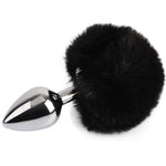 Experience a touch of elegance and playfulness with the Frolics Tail Fur Pom Pom Butt Plug in Black - Medium. This medium-sized butt plug combines sensuality with a luxurious fur pom pom for a unique and exciting sensation. Crafted for comfort and style, it's the perfect accessory to add a bit of whimsy to your intimate encounters.