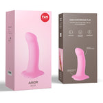 Amor is a semi-realistic dildo with small measurements. 5.3 inches long (a dildo on the small side) and 1.4 inch diameter, the Amor is a little brother to Magnum. The Amor does it in so many different ways: vaginally for beginners and women who like a lighter touch, or anally for those who love longer-lasting pleasure rather than a longer dildo. The silky surface made of 100% medical-grade silicone stimulates in bed, in the bathtub and also in a harness.