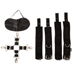 The Hogtie Kit is the perfect accessory for those looking to explore the exciting world of BDSM play. This kit includes everything you need to restrain your partner in a classic hogtie position, which involves binding their wrists and ankles together behind their back. The kit features four sturdy cuffs, one for each wrist and ankle that can be attached or detached from the canter piece and a black blindfold.