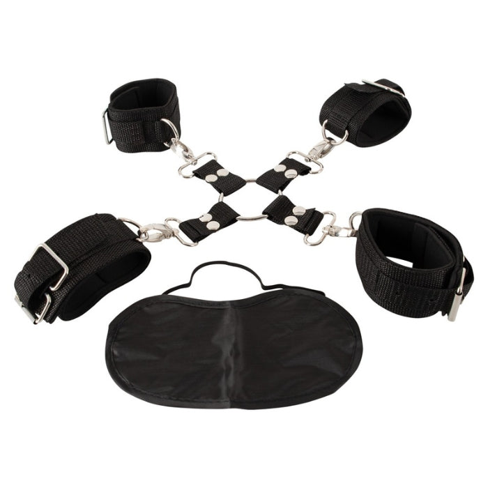 The Hogtie Kit is the perfect accessory for those looking to explore the exciting world of BDSM play. This kit includes everything you need to restrain your partner in a classic hogtie position, which involves binding their wrists and ankles together behind their back. The kit features four sturdy cuffs, one for each wrist and ankle that can be attached or detached from the canter piece and a black blindfold.