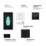 the LILY 3 mini vibrator comes with a manual, Lelo water based lube 5ml sachet, charging cord, satin storage pouch and Lelo warranty card.