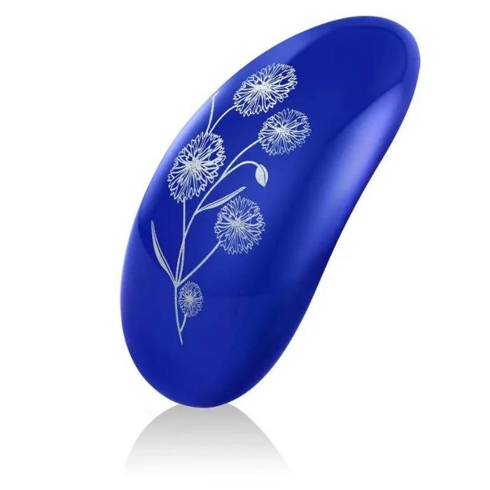 Midnight Blue Lelo Nea 2 clitoral vibrator has a beautiful design on the back in white of some Dandelions