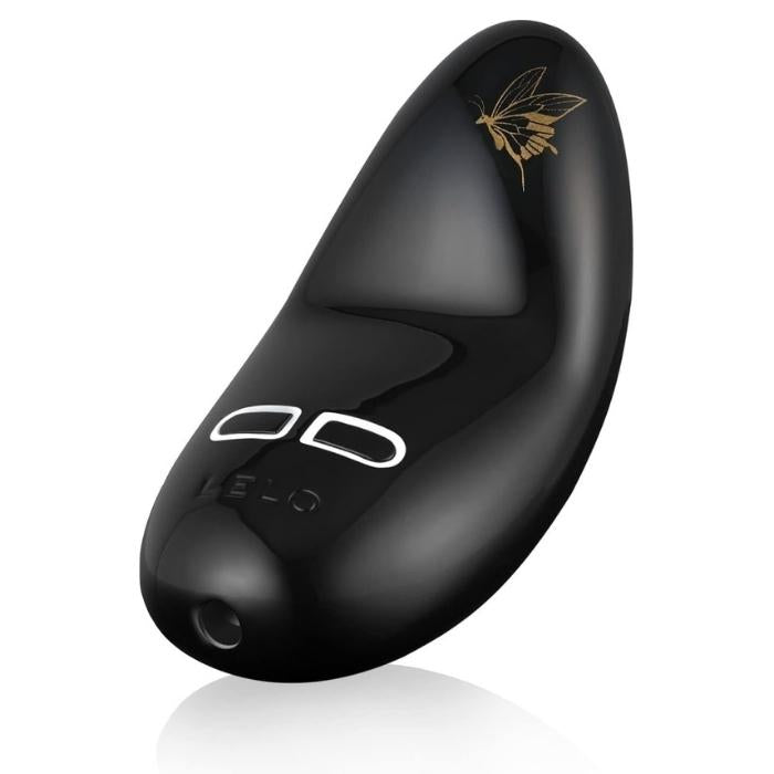 Obsidian Black Lelo Nea 2 clitoral vibrator. This is perfectly shaped for clitoral stimulation with 8 exciting modes. The curved shape encourages foreplay by being able to be used around the shaft of the penis while fitting snugly into your hand for easy teasing! Lay the toy between you and your lover during intercourse. Petite and easy to travel with. Floral design makes this a lovely gifting product. 100% waterproof. USB Rechargeable.