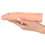 Realistic sleeve It supports a man's stamina because of its tight fit. It also makes the penis approx. 2 cm thicker and extends it by 3 cm. Complete length 19.5 cm, insertion depth 16.5 cm, inner Ø 2.5 cm.