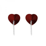 Nipplicious Dominatrix Leather Collar and Heart shaped Pasties with Chains, colour red. These sexy, erotic pasties not only bring out your individual erotic flare, but will drive your lover wild with intense passionate excitement!