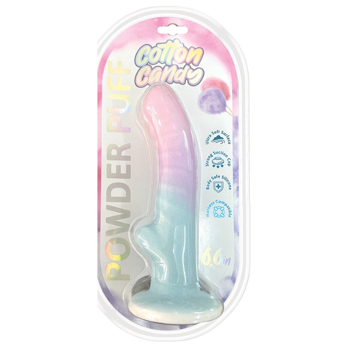 The Cotton Candy Dildo is 6.5 inches of sensory goodness. Contoured and curved in order to reach and massage your G-Spot or P-Spot and wake up nerve endings all along the vaginal or anal canal. Glitter sparkles throughout the dreamy gradient of pastel colors that run the length of the shaft. Attach the strong suction cup base to any hard surface or slip this dreamy dildo into a harness of your choice.