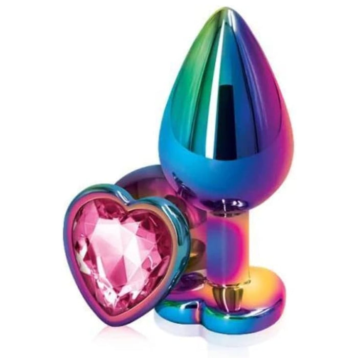 Rear Assets Rainbow Anal Plug with Pink Stone Heart - Medium. Rear Assets Rainbow Anal Plug with Pink Stone Heart - Medium. Anal play has never been a prettier sight with this gorgeous jeweled, steel anal plug. Bulbous in form, a tapered tip ensures an easy introduction, while the broad steel bulb fills and satisfies. Perfect for anal enthusiast.