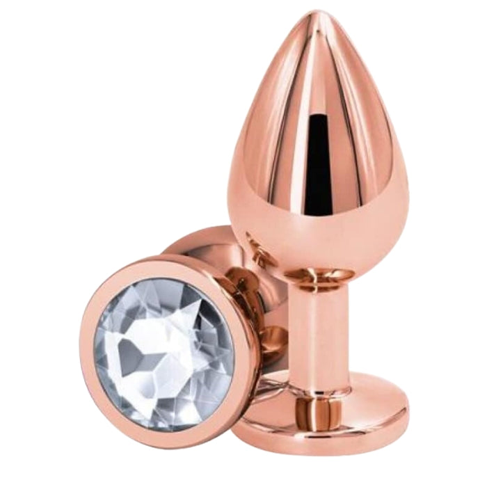 Rear Assets Rose Gold Anal Plug with Clear Stone Round - Medium. Anal play has never been a prettier sight with this gorgeous jeweled, steel anal plug. Bulbous in form, a tapered tip ensures an easy introduction, while the broad steel bulb fills and satisfies. Perfect for anal enthusiast.