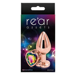 Rear Assets Rose Gold Anal Plug with Rainbow Stone Heart - Small. Anal play has never been a prettier sight with this gorgeous jeweled, steel anal plug. Bulbous in form, a tapered tip ensures an easy introduction, while the broad steel bulb fills and satisfies. Perfect for anal enthusiast.