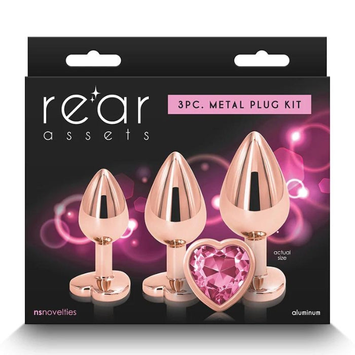 This dazzling anal trainer kit includes three Gold chrome-plated heart jewel plugs in graduated sizes, shaped for effortless penetration. Ideal for training solo or with a partner, these are body safe and available in a variety of colors, shapes, and sizes. Suitable with all lubricants. Dimensions: S: 2.76 x 1.26 x 1.26 (Inches) M: 3.23 x 1.34 x 1.34 (Inches) L: 3.66 x 1.61 x 1.61 (Inches).