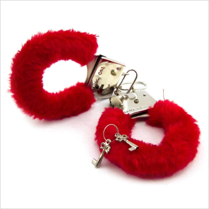 Red fluffy handcuffs with keys. Playful yet loads of fun. Start your bondage fantasies with this little accessory.