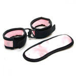 Unapologetically sexy &amp; ferociously fun! An Entrenue exclusive! Light pink satin with black trim just purrrs Sex Kitten! Made of comfortable adjustable fabric and sturdy hardware.This hot little set is fun, sassy, and ready to tame your wild side!