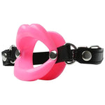 Create a sexy lipstick fantasy with the Silicone Lips open mouth gag. Wrap your lips around the gag and secure. Secure with adjustable vegan leather strap and buckle closure.&nbsp;One size fits most.