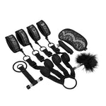 Steamy Shades Binding Set - 7 Piece, a complete collection designed to awaken your senses and fulfill your deepest fantasies. With hand and ankle cuffs that can be used for hogtie or as bed restraints, as well as some rope that you can explore a variety of restraining positions. The included blindfold adds an element of anticipation and heightened sensation, while the tickler allows you to tantalize and tease your partner's most sensitive spots.