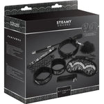 Steamy Shades Bondage Set - 7 Piece, a comprehensive collection designed to ignite your passion and explore the world of BDSM. This set includes seven carefully curated pieces that cater to your deepest desires. Collar With Leash & Nipple Clamps | 1 x Feather Tickler | 1 x Riding Crop | 1 x Blindfold | 1 x Silk Bondage Rope | Wrist Restraints.