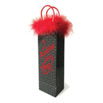 A wine-sized gift bag that holds any fun & sexy gift you want to give. With "I Fucking Love you!" written on.