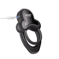 Black silicone anello vibrating double cock ring with clitoral stimulator features sleek design and integrated charging port for erection firmness and long distance control
