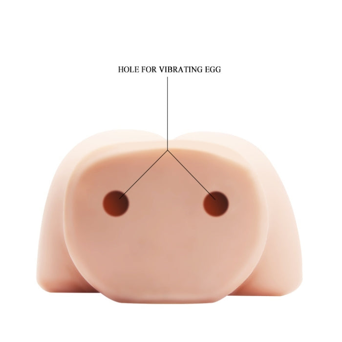 Flesh-colored silicone life size replica with dual indentations for vibrating egg use