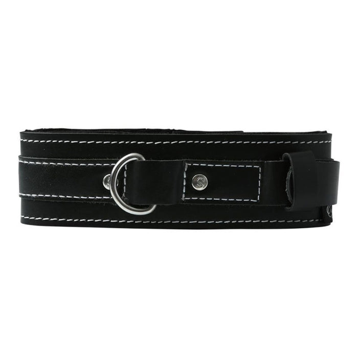 This luxury lined collar guards the wearers neck with subtle strength, providing an extra soft touch on supple napes. The cowhide leather BDSM collar features a solid, metal D-Ring for easy leash attachment allowing you the comfort to control your sub casually or intensely. Fits necks, inside diameter from 8.89cm to 15.36cm.