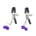 A pair of black-handled metal clamps with purple bells from the everything bondage 12 piece kit fur lined pvc accents