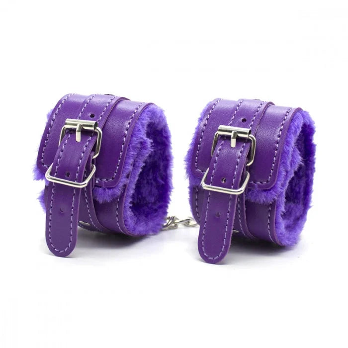Purple leather wrist cuffs from everything bondage 12 piece kit with soft faux fur lined fur lined pvc and silver buckles