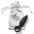 Dark-colored silicone butt plug with ring base from Fifty Shades of Grey collection