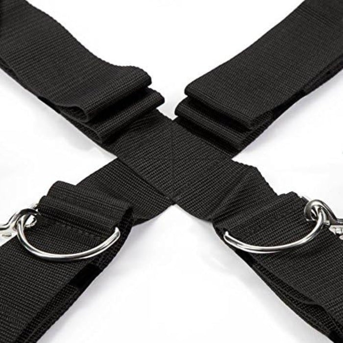 Explore new styles of bondage play with this over the bed cross restraint, which allows ankle and wrist cuffs to be positioned both vertically and horizontally. The quality wrist and ankle cuffs feature a soft satin exterior, with the inside lined with faux fur for a truly comfortable experience. Fastened by secure, adjustable Velcro, the cuffs are simple for a partner to secure and remove, yet provide a highly effective restraint tool for the wearer.