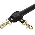 Fifty Shades of Grey Spreader Bar - Bound to You Black is a lightweight, durable and strong 50,8 cm handcrafted faux leather spreader bar with antique gold hardware. This cleverly designed bar has 4 swivel lobster clasps and is compatible with the Bound to You wrist and ankle cuffs.