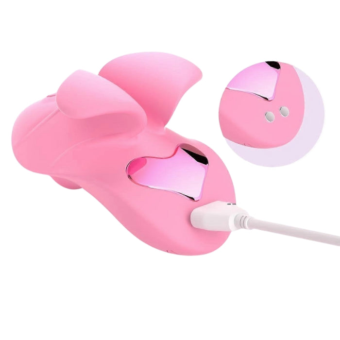 Pink USB rechargeable finger vibrator with heart detail and rabbit shape
