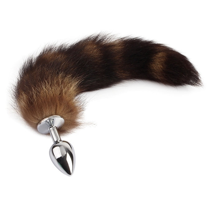 Unleash your wild side with the Frisky Fox Tail Butt Plug in Brown - Small. This playful accessory combines an intimate experience with a touch of animalistic allure. The small size ensures comfort and ease of use, while the realistic fox tail adds a unique visual element.