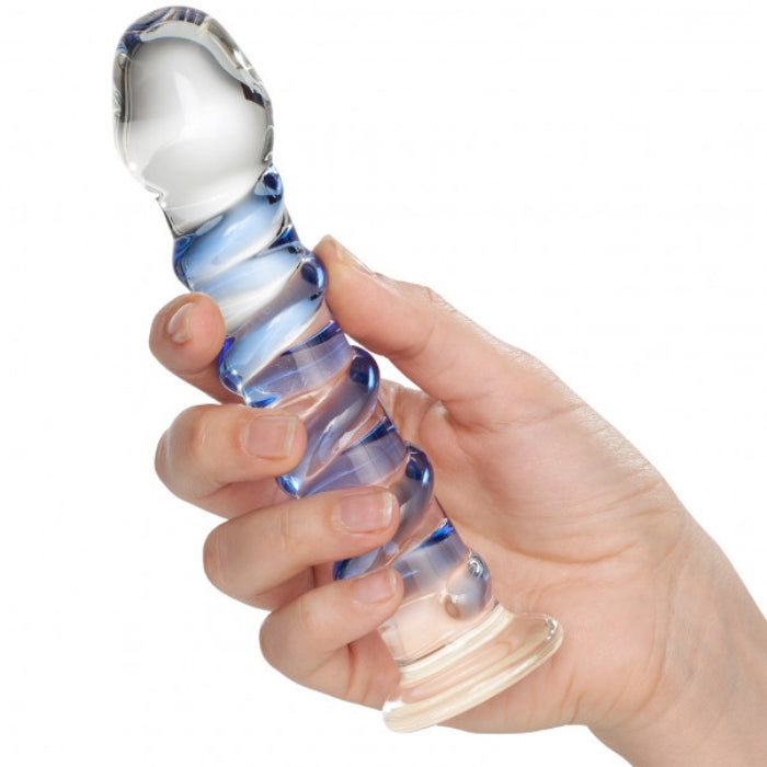 Icicles No.5  7" Glass Dildo - Blue Swirl. Elegant, upscale, and hand-crafted with amazing attention to detail, this luxurious line of glass massagers will leave you breathless. Each hand-blown Icicle glass wand is sleek and unique. The hypoallergenic glass is nonporous and body safe, and when cared for properly, is designed to last a lifetime. Run the wand under warm water to heat things up, or chill it under cold water for a cool sensation. 