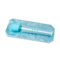 Le wand massager all that glimmers blue with silver glitter finish and turquoise silicone head for women’s health femtech use