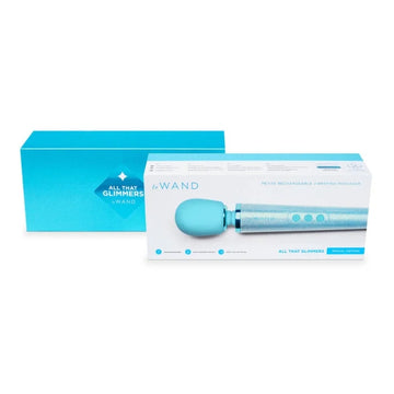 Le wand massager all that glimmers blue is a sleek light blue rechargeable wand massager for women’s health femtech